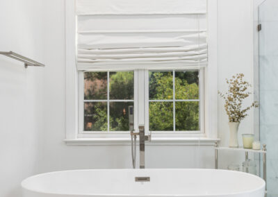 Clean, bright bathroom tub real estate listing photo in Greenville, SC