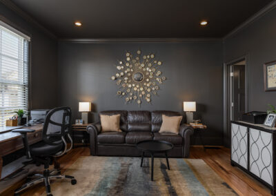 Luxurious dark painted home office photo for custom home builder in Greenville, SC